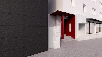 small house big door