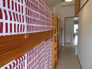 guesthouse hyakumanben cross