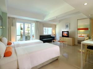 harris hotel and residence riverview kuta bali