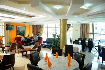 zola international hotel