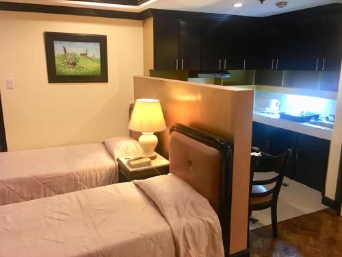 lourdes family suites makati powered by cocotel