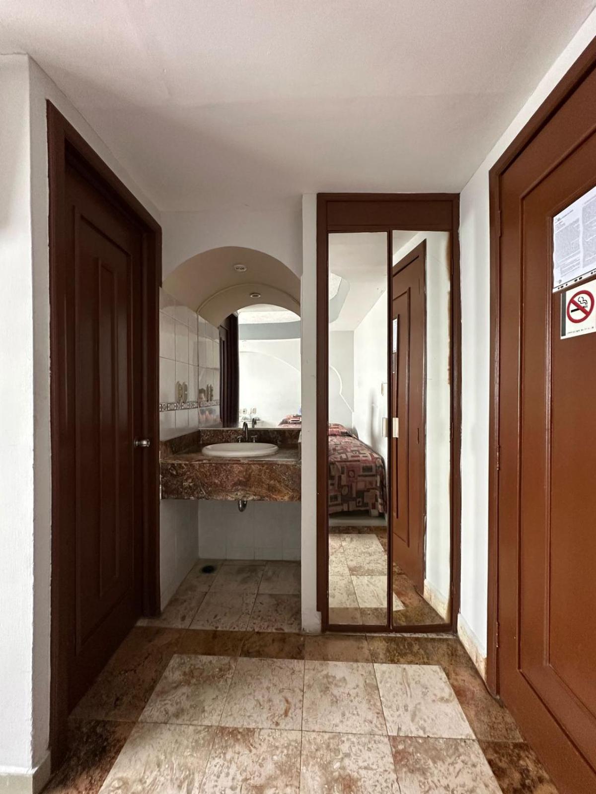 impala hotel in front of the ado