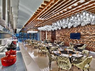 v hotel dubai curio collection by hilton