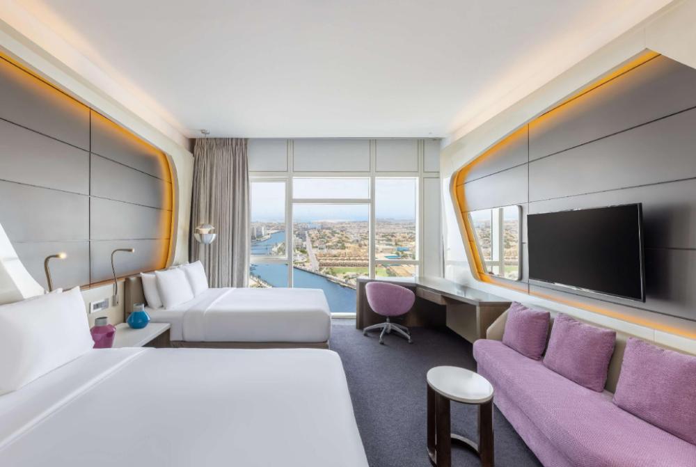 v hotel dubai curio collection by hilton