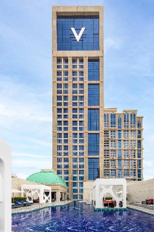 v hotel dubai curio collection by hilton