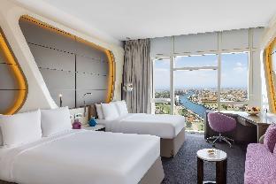 v hotel dubai curio collection by hilton