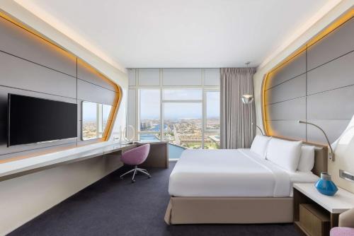 v hotel dubai curio collection by hilton
