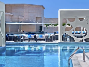 v hotel dubai curio collection by hilton