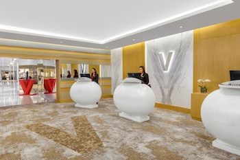 v hotel dubai curio collection by hilton