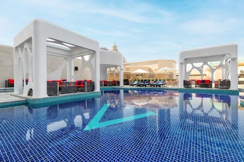 v hotel dubai curio collection by hilton