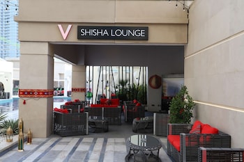 v hotel dubai curio collection by hilton