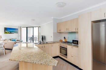the village holiday apartments at burleigh