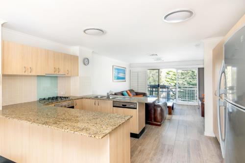 the village holiday apartments at burleigh