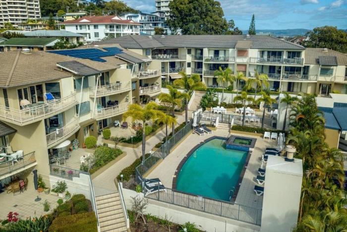 the village holiday apartments at burleigh