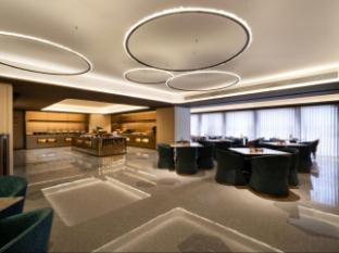 qinghui garden orange crystal hotel