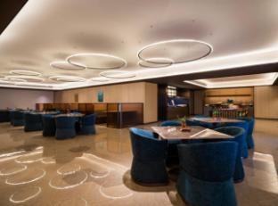 qinghui garden orange crystal hotel