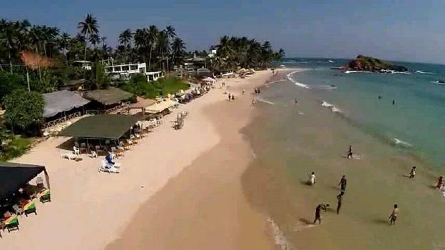 sunset beach mirissa