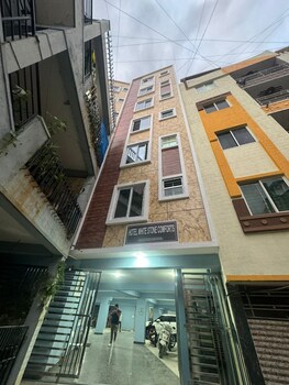 white stone apartments