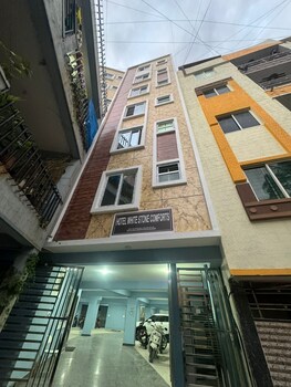 white stone apartments