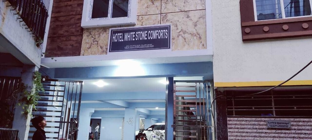 white stone apartments