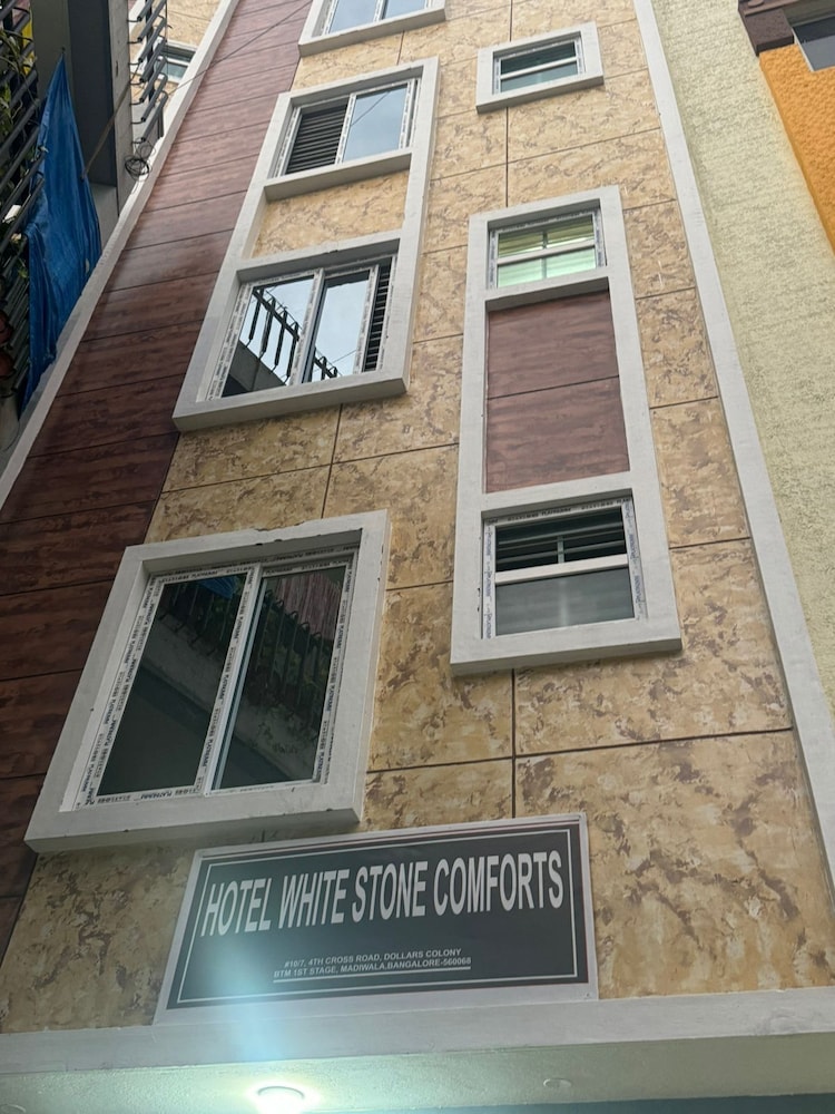 white stone apartments