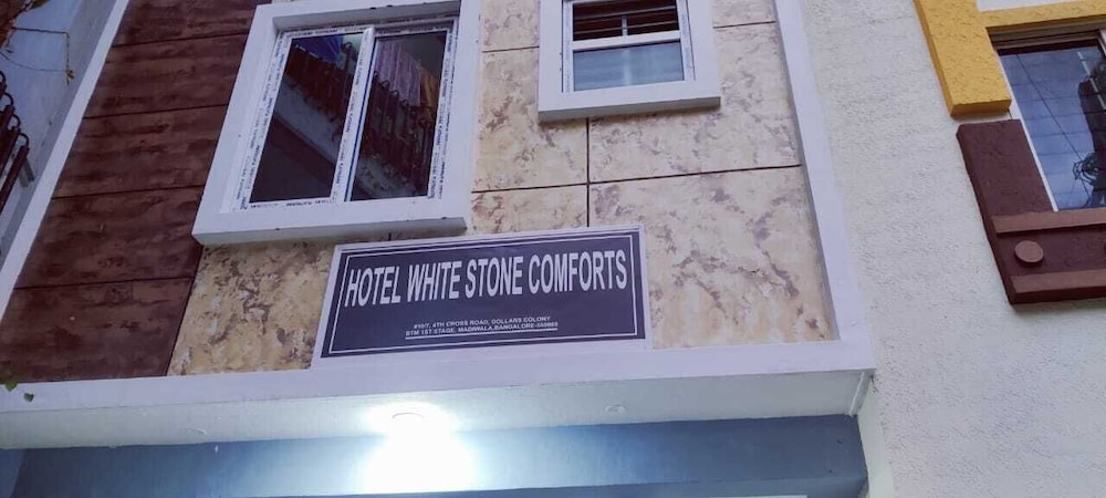 white stone apartments