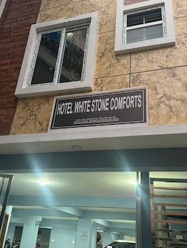 white stone apartments