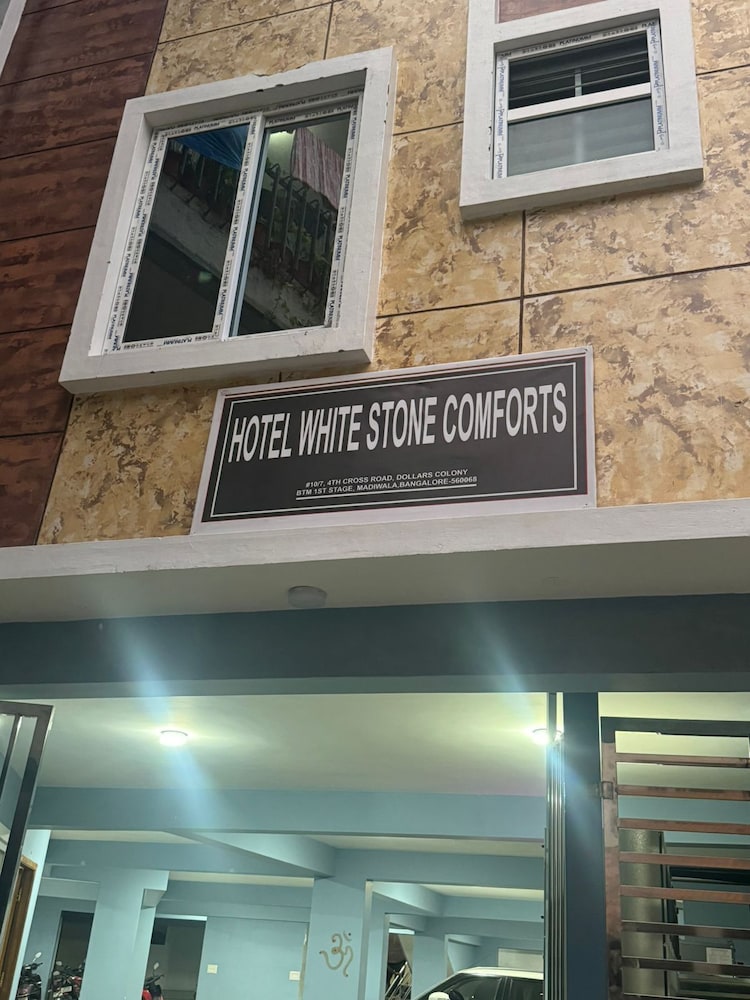 white stone apartments