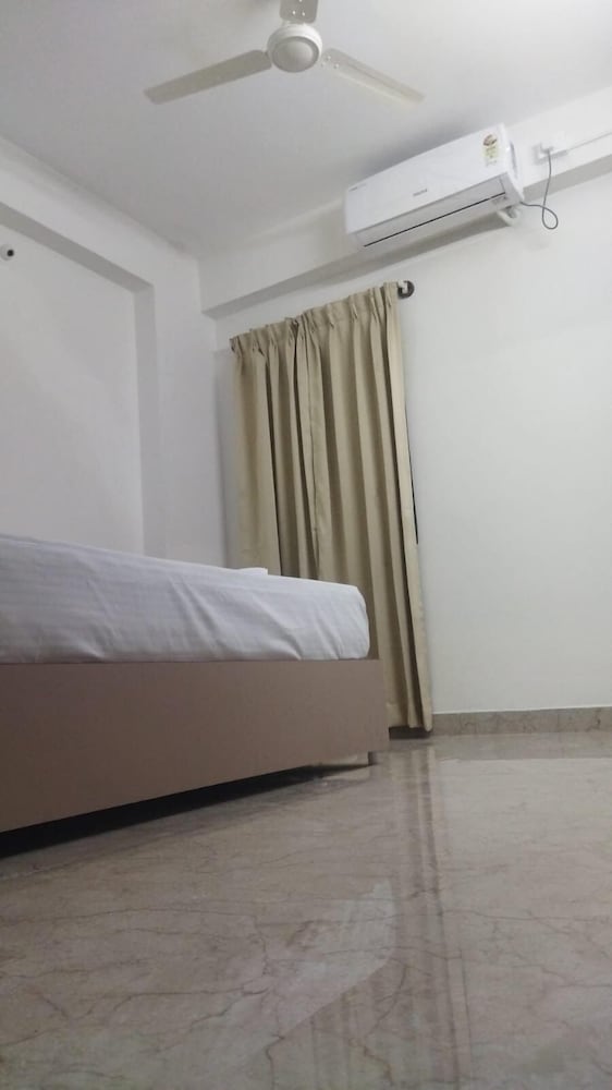 white stone apartments