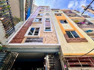 white stone apartments