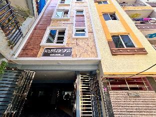 white stone apartments