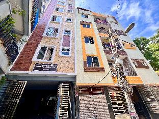 white stone apartments