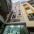 white stone apartments