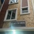 white stone apartments