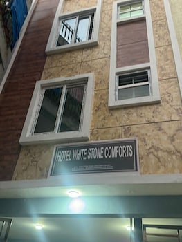 white stone apartments