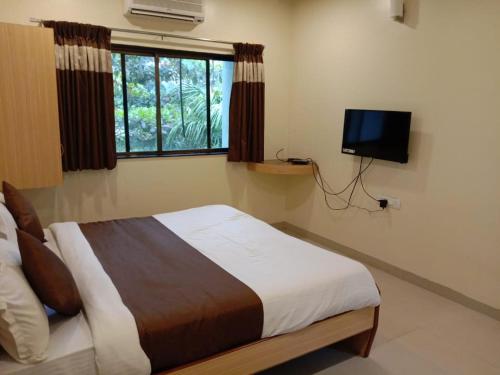 aquarius resort by oyo