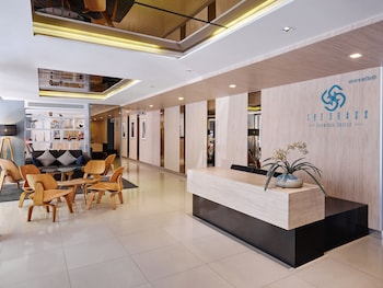 the grass serviced suites by at mind