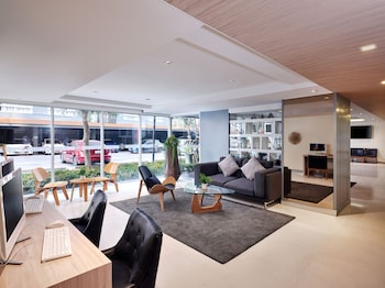 the grass serviced suites by at mind