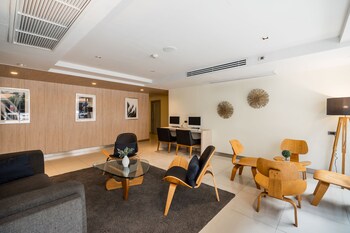 the grass serviced suites by at mind