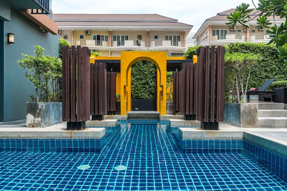 the grass serviced suites by at mind