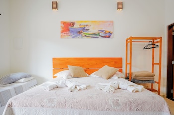 velinn pousada toca do guaiamum