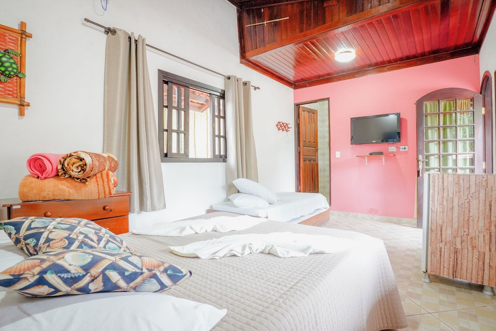 velinn pousada toca do guaiamum