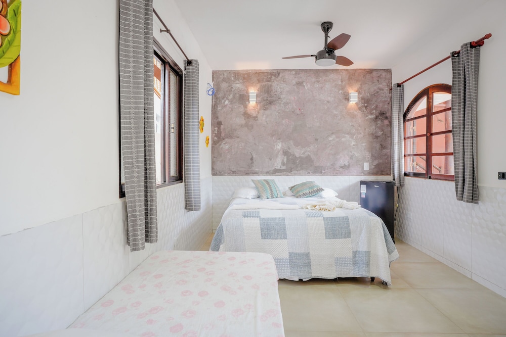 velinn pousada toca do guaiamum