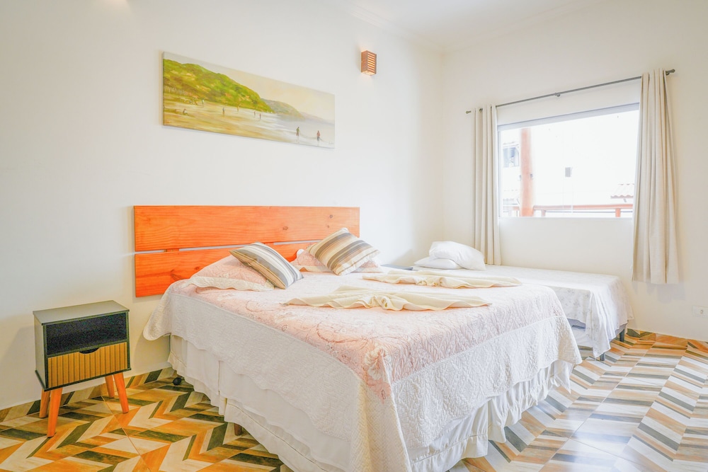 velinn pousada toca do guaiamum