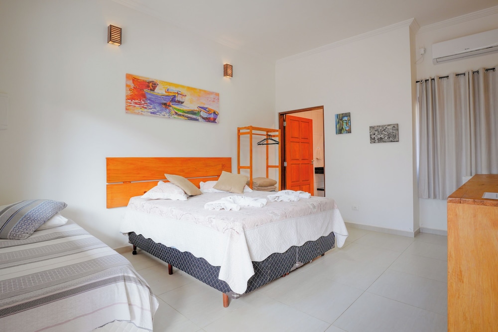 velinn pousada toca do guaiamum