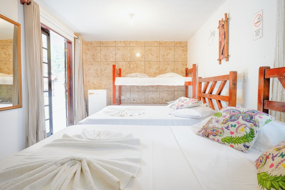 velinn pousada toca do guaiamum