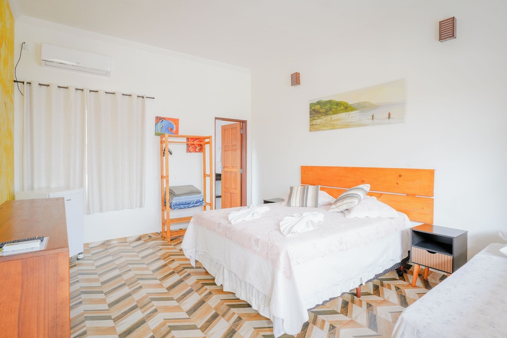 velinn pousada toca do guaiamum