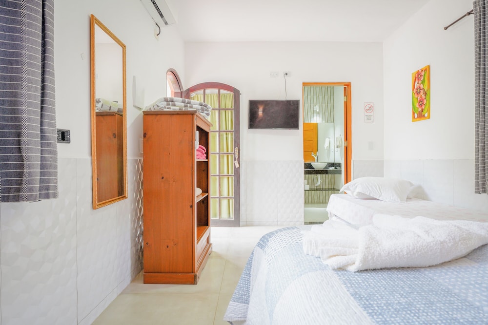 velinn pousada toca do guaiamum