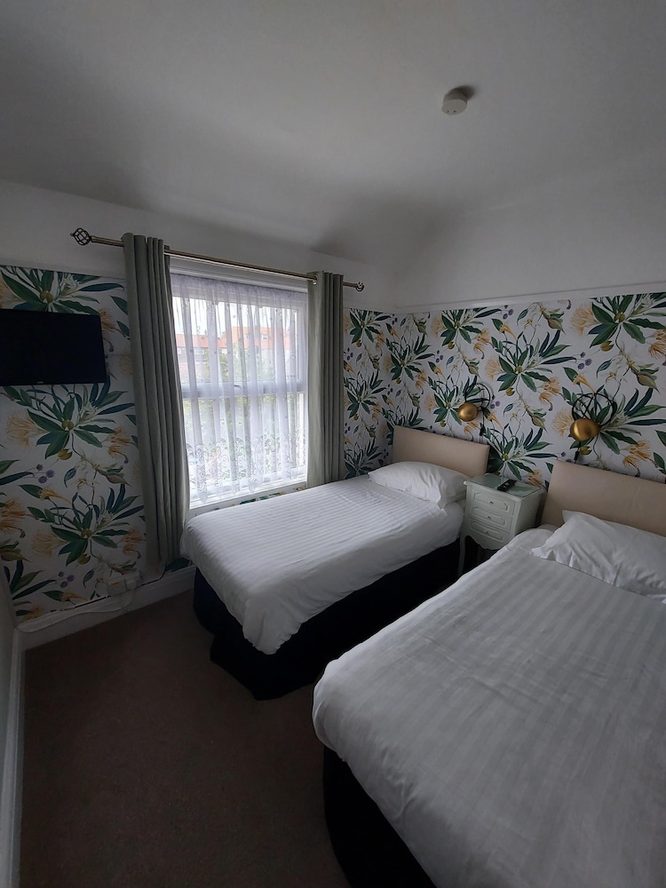 the hilary guest house adults only