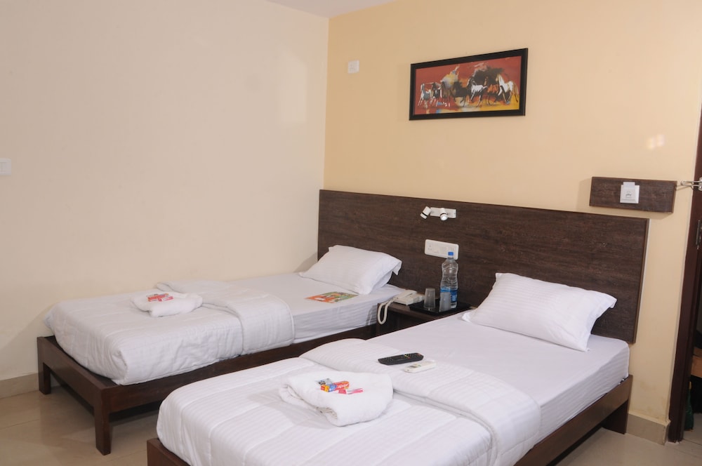 hotel orange inn manapakkam chennai